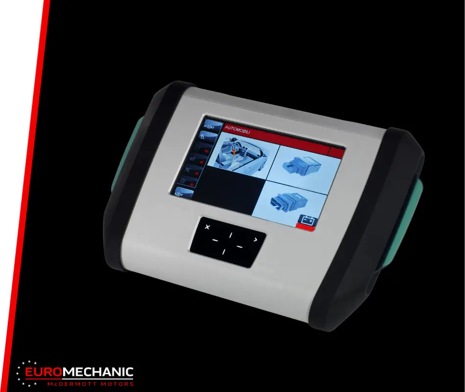 A digital diagnostic device with a screen displaying technical diagrams rests on a black surface, encased in sleek white and black. In the bottom left corner, a red and white striped border highlights EuroMechanic and McDermott Motors during a Car Checkup Greater Toronto session. EuroMechanic | Top Reviewed Auto Repair Shop | Greater Toronto and Guelph | Visit Euromechanic