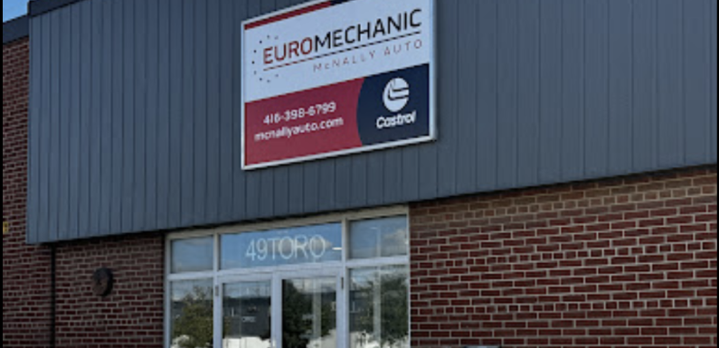 A brick and metal facade hosts the Euro Mechanic McNally Auto sign, complete with contact details. Nearby, a glass door prominently displays the street number 49 TORO. The Castrol logo is featured on this prime locations signage. EuroMechanic | Top Reviewed Auto Repair Shop | Greater Toronto and Guelph | Visit Euromechanic