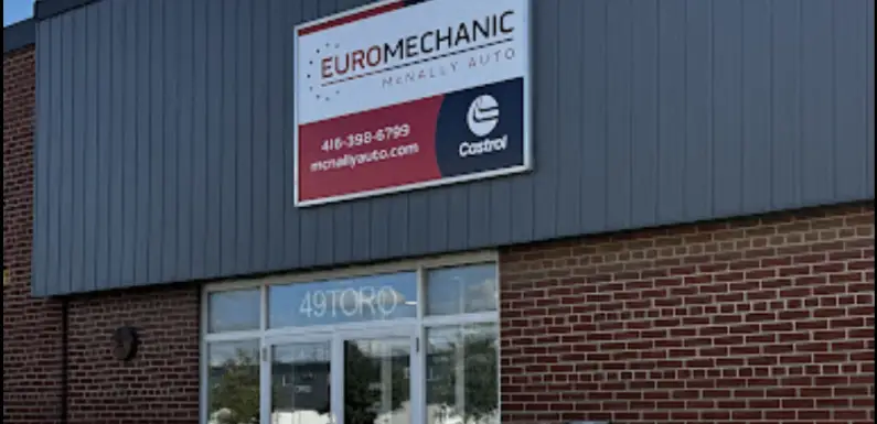 A brick and metal facade hosts the Euro Mechanic McNally Auto sign, complete with contact details. Nearby, a glass door prominently displays the street number 49 TORO. The Castrol logo is featured on this prime locations signage. EuroMechanic | Top Reviewed Auto Repair Shop | Greater Toronto and Guelph | Visit Euromechanic